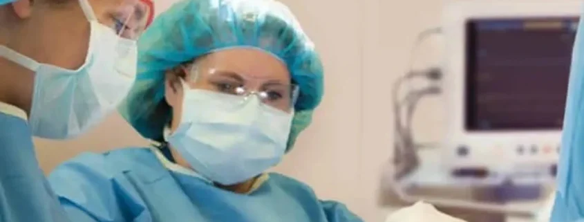 Orthopedic surgeon discussing outpatient hip and knee replacement with a patient